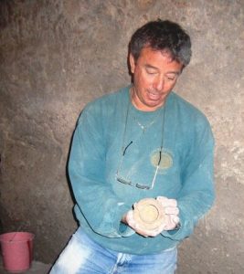 Archaeologist Ian Stern, above, holding a small jug