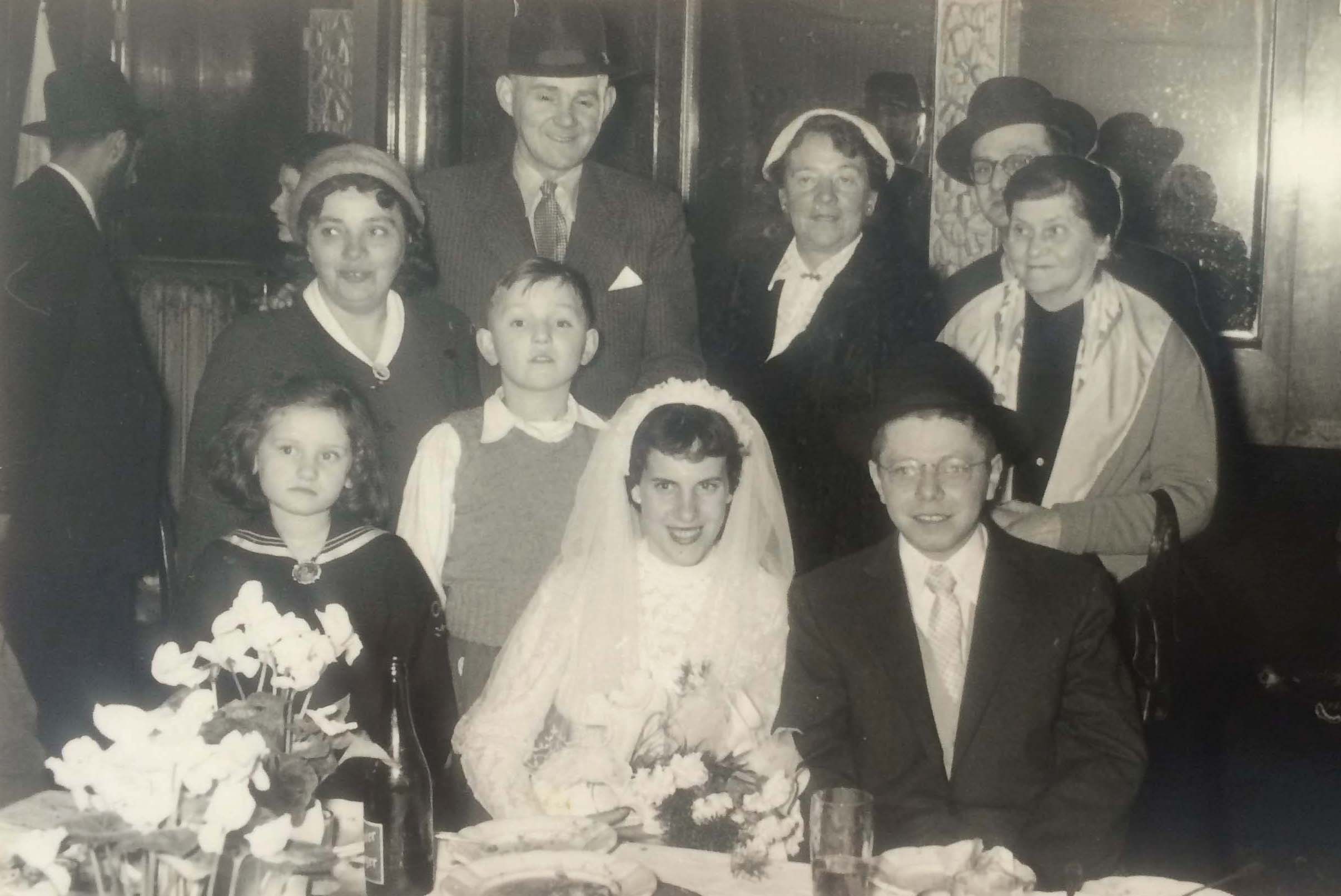 Safely in Vienna. Andor Platschek and his bride (seated) celebrate their wedding, with Piroska, Jeno, and Paul Lindenblatt in the background together with members of the bride’s family