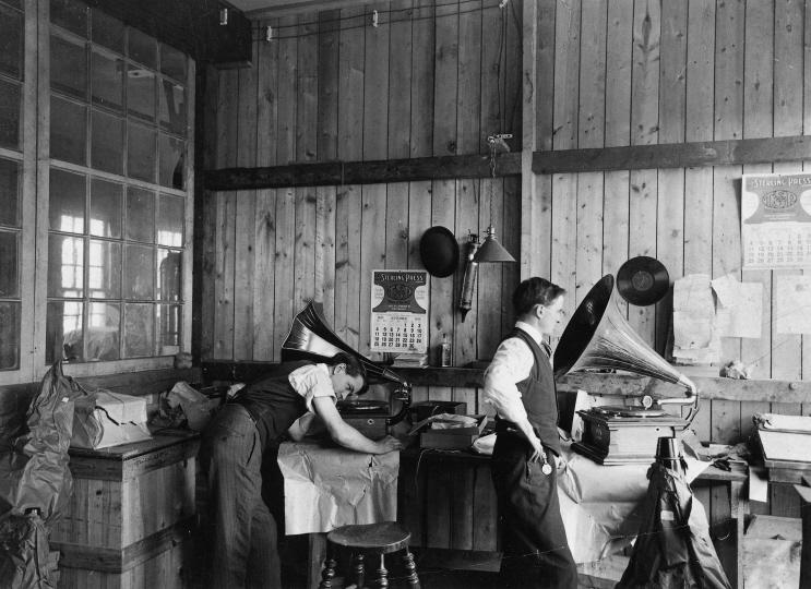 Berliner Gramophone company employees examine their products in Montreal, 1910