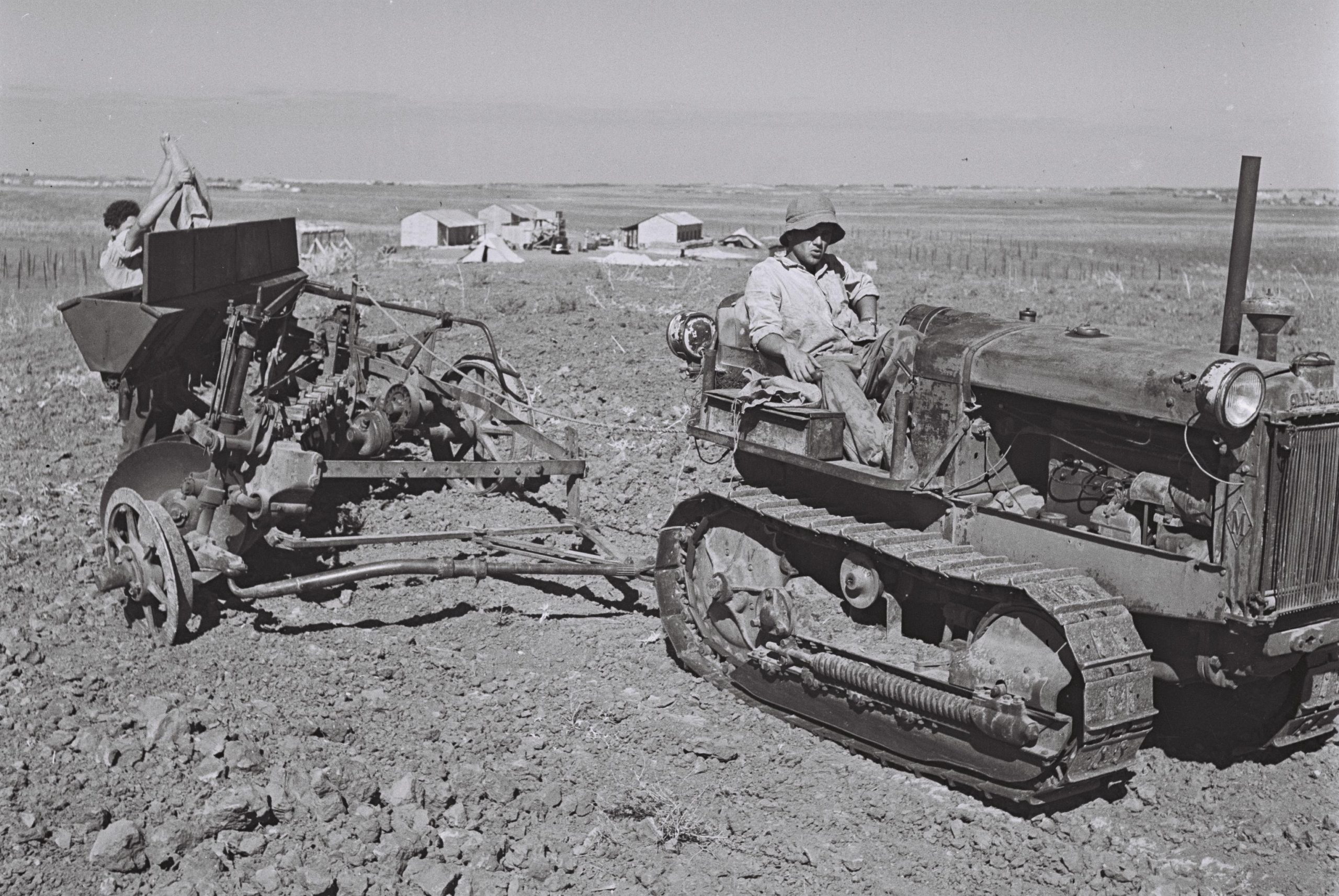 Pioneers plow the fields of Kibbutz Kedma, one of the 11 points in the Negev. November 1946