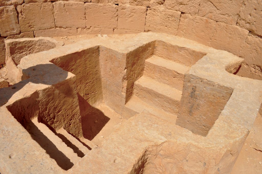 The cross-shaped baptismal font at Shivta typifies Nabatean cities