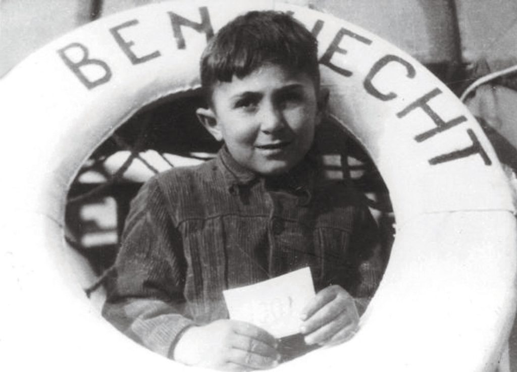 The youngest refugee aboard the SS Ben Hecht peers through a life preserver. The Bergson Group published such images widely, raising awareness of Jewish DPs