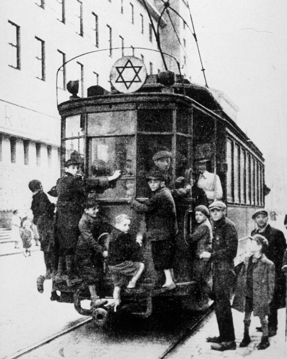 Rabbi Kalonymus Kalmish Shapira, the Piaseczno Rebbe, exhorted Jews to remain observant even in the harsh conditions of the ghetto. Jewish children grab a tram-ride in the Warsaw ghetto, 1940