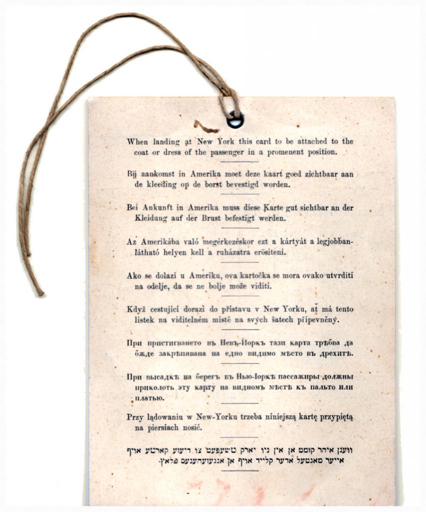 Reverse side of the immigration tag attached to immigrants’ outer garments. The instructions appear in English, German, Russian, and Yiddish (in Hebrew characters)