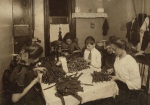 A Jewish family working on garters in its tenement kitchen in New York, 1912. Like other immigrants, the Jews lived in terribly crowded conditions. While the first generation focused on economic survival, the second and third left the “ghetto” for the more spacious suburbs