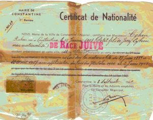 נותרו ללא אזרחות. תעודת אזרחות מטעם עיריית קונסטנטין באלג'יריה שעליה החותמת 'מגזע יהודי'. המשפט המעיד על אזרחות מחוק