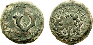 Bronze coin minted by Alexander Jannaeus (103–76 BCE). On one side is an anchor surrounded by the Greek inscription “of King Alexander.” On the other, a three-petalled lily and the name Jehonathan in ancient Hebrew 