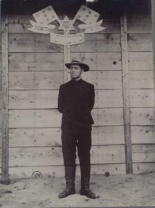 First steps in Jewish leadership and defense. Trumpeldor in captivity in Kobe, Japan, beneath the symbol of his organization